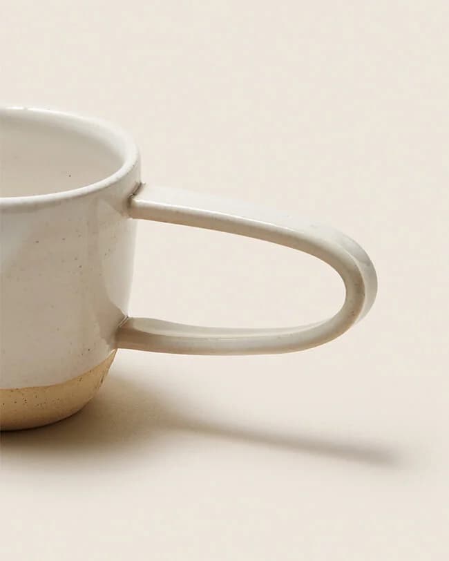 Ceramic cup shown in the source product-page template